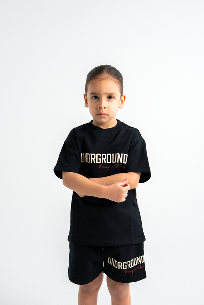 UG MOVING IN SILENCE SHORTS KIDS 'BLACK/CREAM'