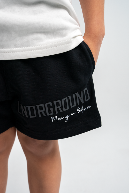 UG MOVING IN SILENCE SHORTS KIDS 'BLACK/CHARCOAL'